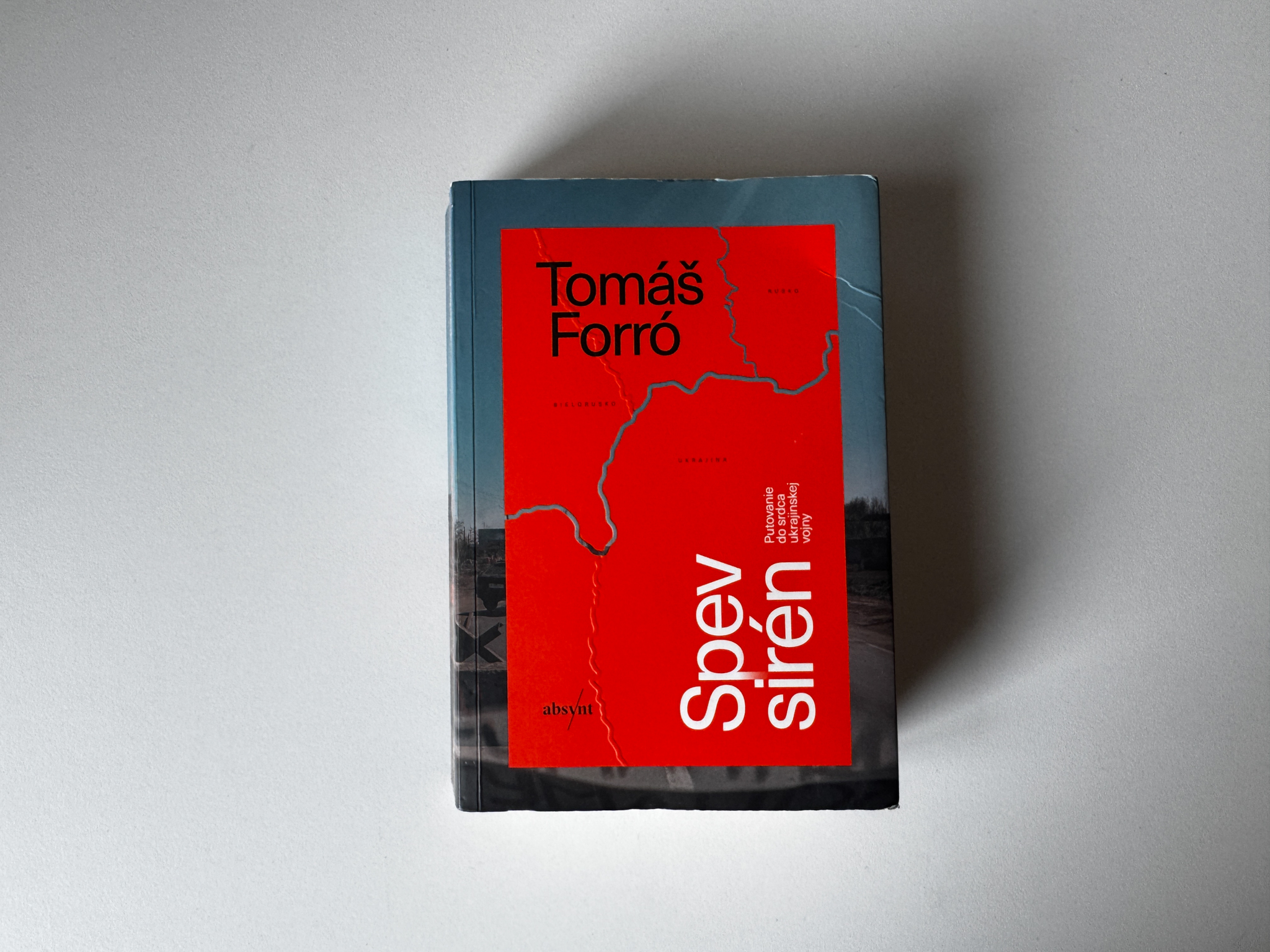 Book Spev Siren by Tomas Forro on a white table